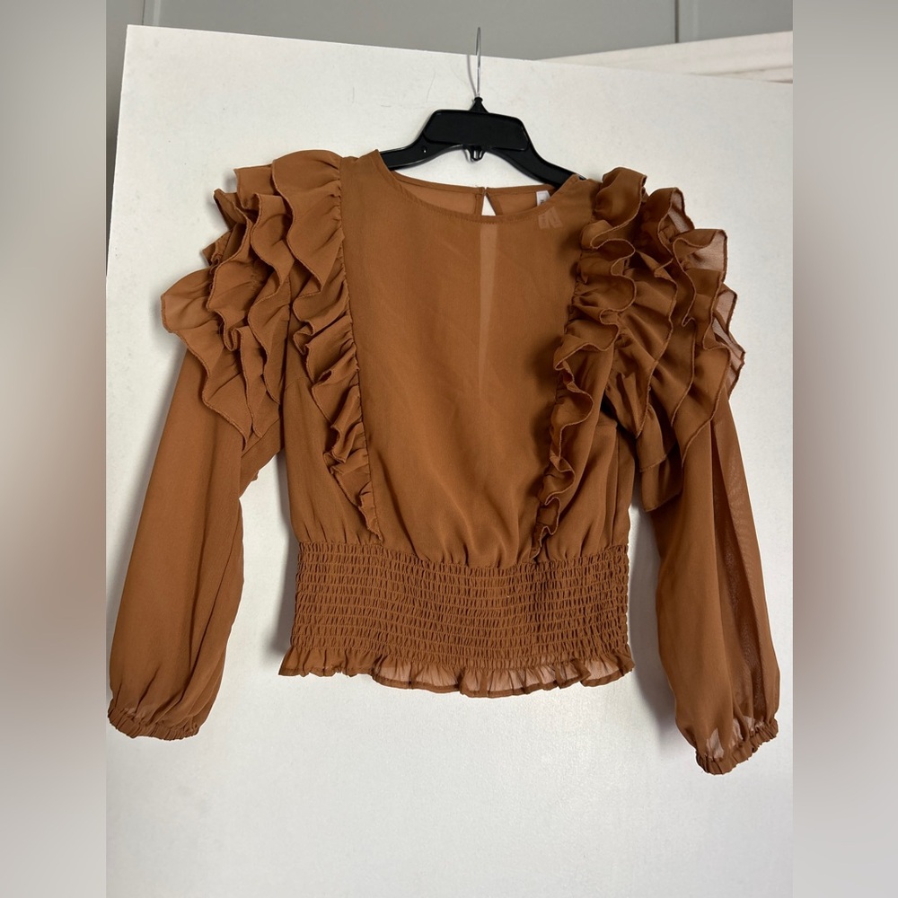 Live 4 Truth. Brown ruffled shirt.